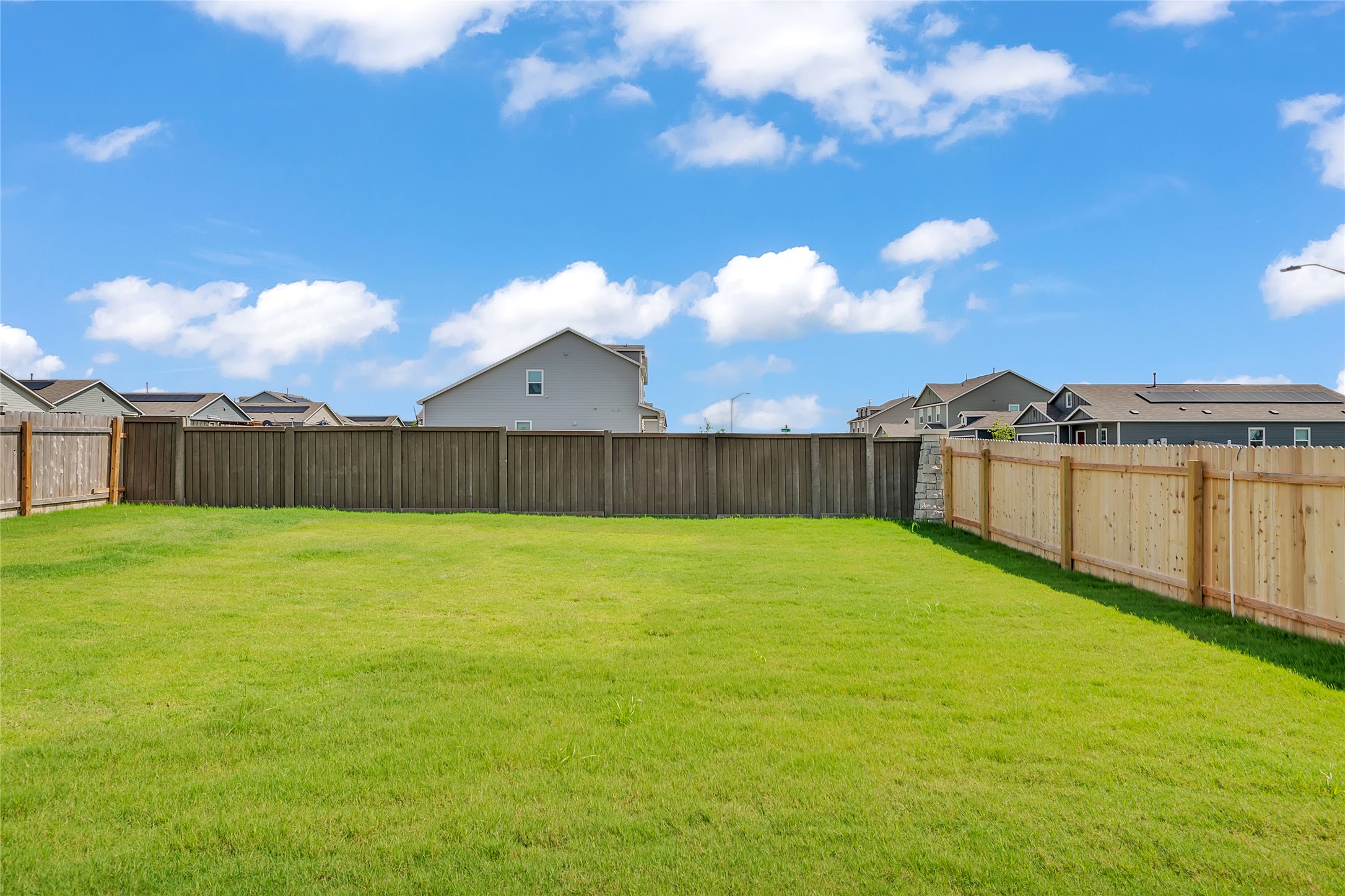 2528 Willkomen Way Manor, TX 78653 - Photo 19 of 21 a view of a backyard