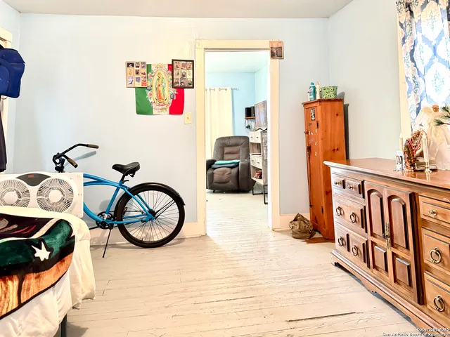 a view of an entryway with wooden floor