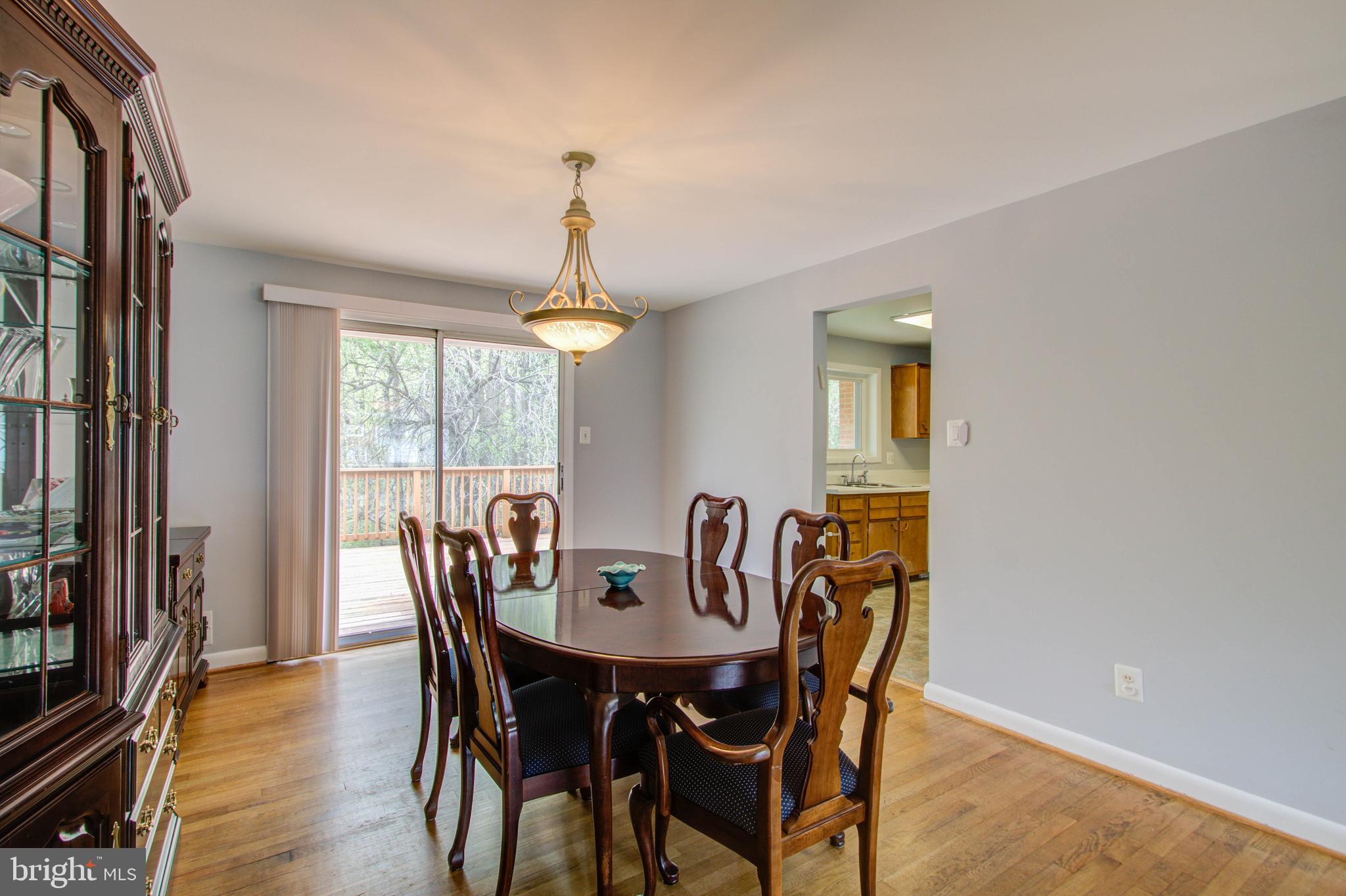 10604 Woodsdale Drive Silver Spring, MD 20901 - Photo 7 of 30 Spacious dining room with sliders to yard.