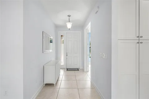 a view of a workspace with furniture