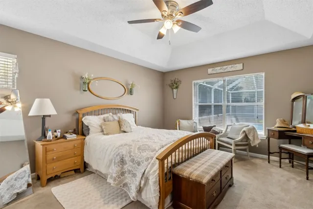 a bathroom with double vanity sinks and a mirror