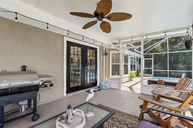 a view of a swimming pool with a lounge chair