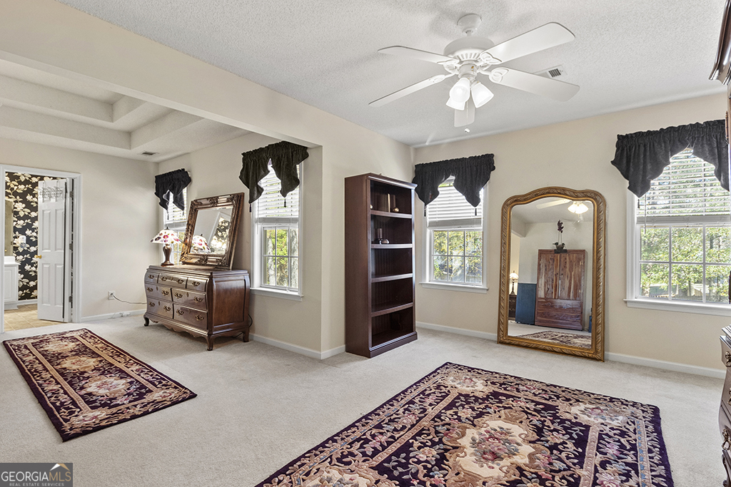 643 Millrun Court Macon, GA 31210 - Photo 21 of 32 a bedroom with furniture and window