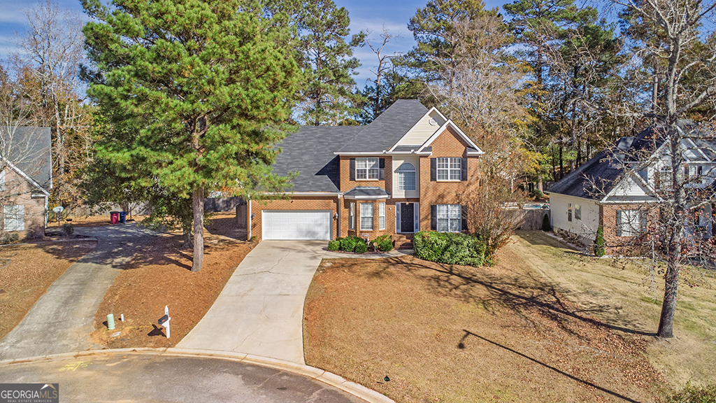 643 Millrun Court Macon, GA 31210 - Photo 3 of 32 a front view of a house with a yard