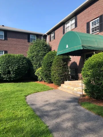 a view of a back yard of the house