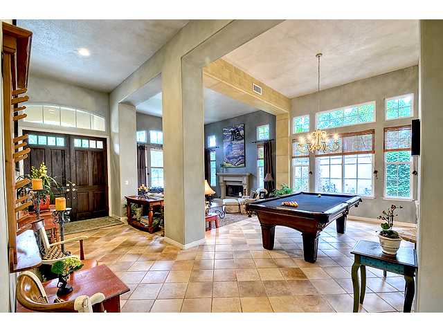 982 Merganser Lane Carlsbad, CA 92011 - Photo 2 of 20 Double entry doors open up to the beautiful living,dining room areas.