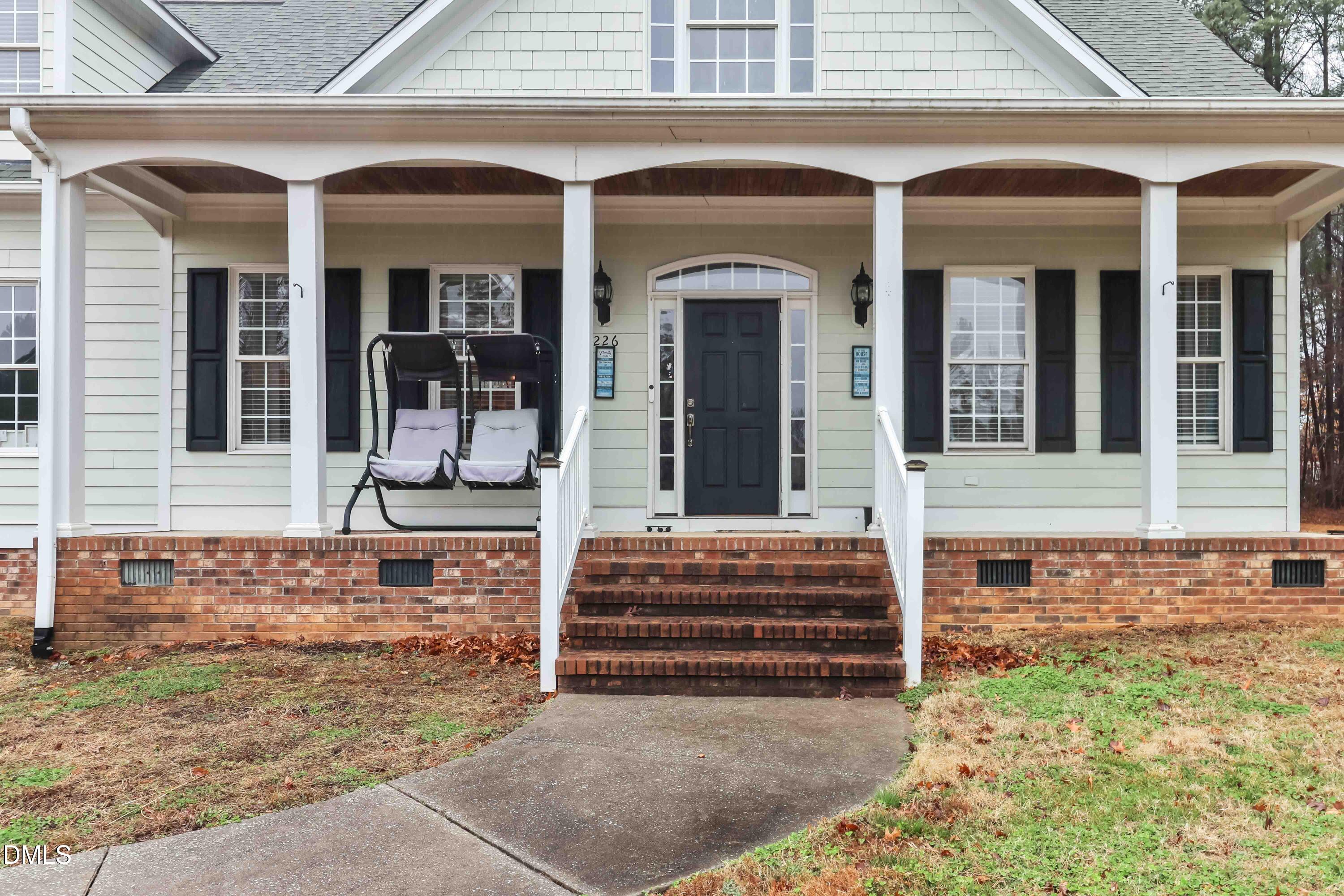 226 Fletcher Ridge Road Timberlake, NC 27583 - Photo 24 of 30 front view of a house with a large window