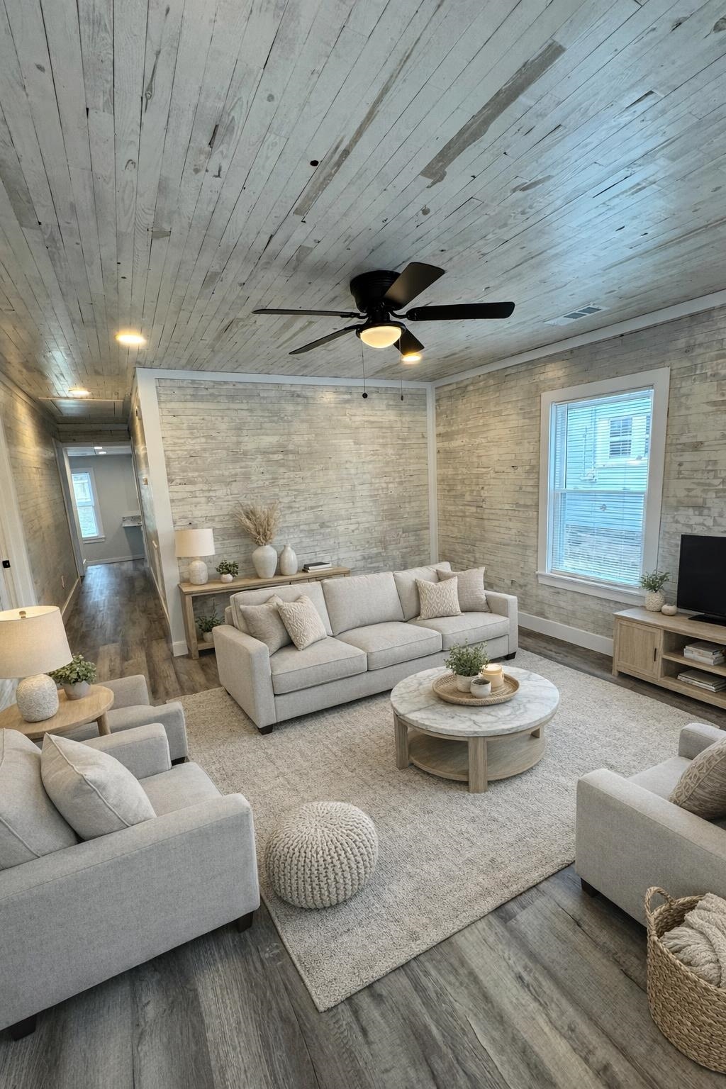 311 East Ripley Avenue Covington, TN 38019 - Photo 36 of 37 a living room with furniture and a flat screen tv