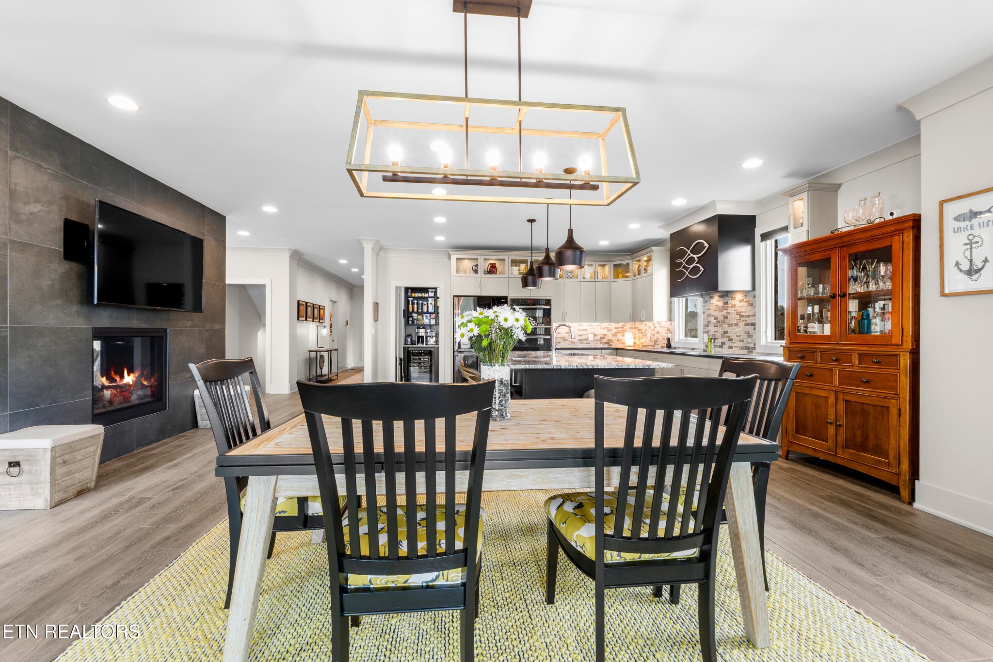 3702 Promontory Point Louisville, TN 37777 - Photo 6 of 60 a view of a dining room with furniture and wooden floor