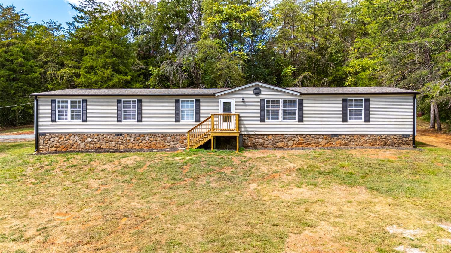 397 Dreaming Creek Road Spout Spring, VA 24538 - Photo 1 of 39 a house with trees in the background