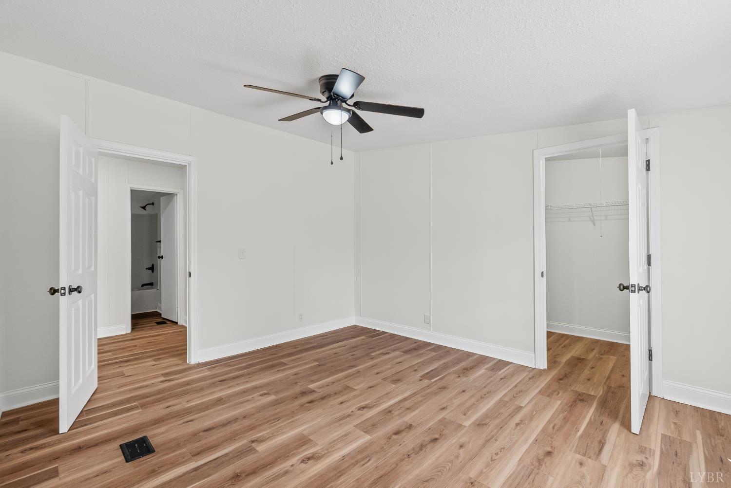 397 Dreaming Creek Road Spout Spring, VA 24538 - Photo 25 of 39 a view of empty room with wooden floor