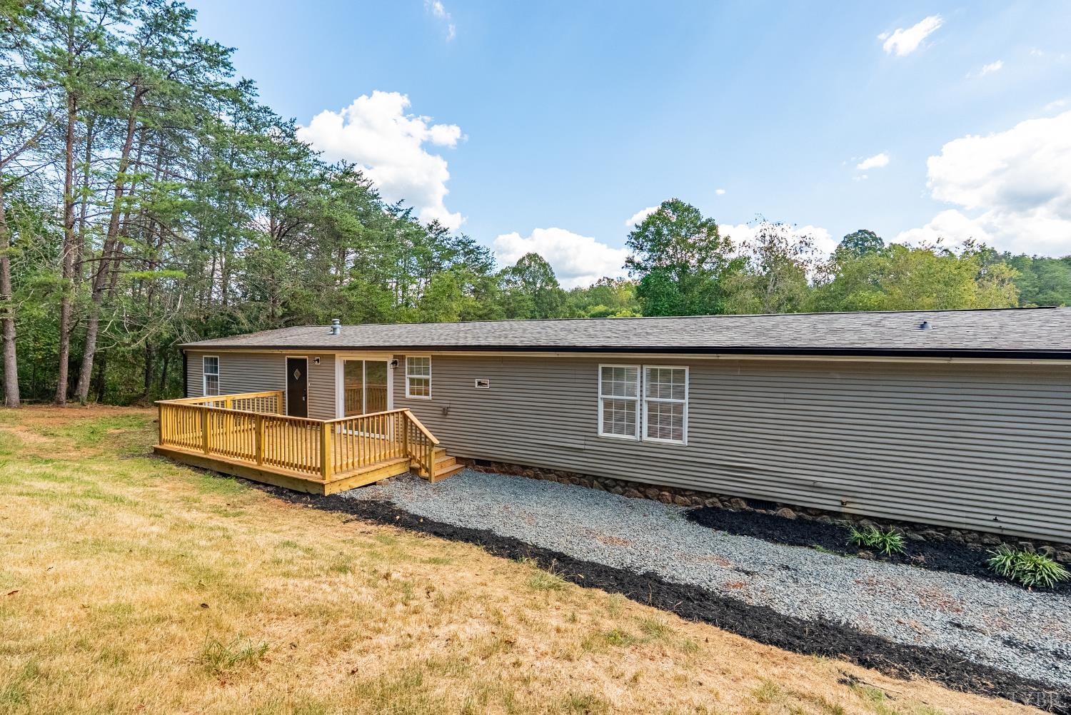397 Dreaming Creek Road Spout Spring, VA 24538 - Photo 29 of 39 a view of a house with a yard