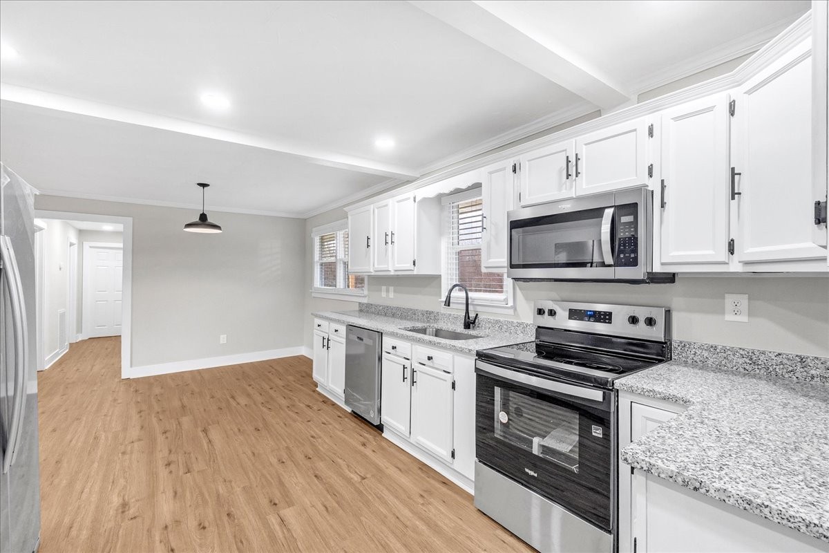 838 Pete Sain Road Manchester, TN 37355 - Photo 15 of 34 Kitchen- New flooring, appliances, recessed lighting.