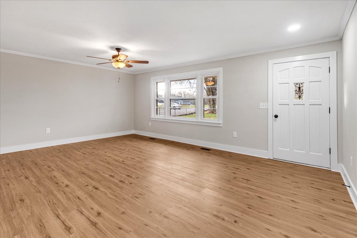 838 Pete Sain Road Manchester, TN 37355 - Photo 6 of 34 Living Room- New Flooring, paint and lighting.