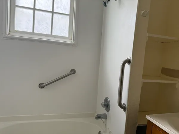 a bathroom with a bathtub