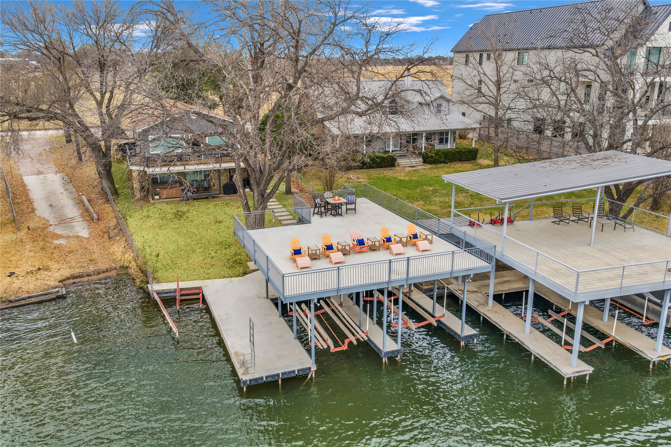 an aerial view of a house with swimming pool garden and mountain view