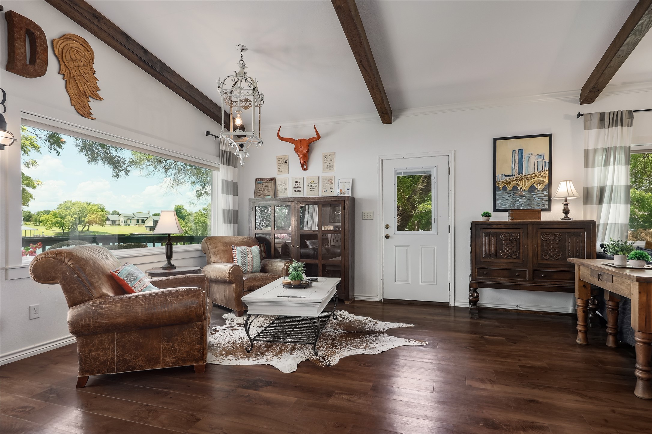 525 Ellen Williams Loop Kingsland, TX 78639 - Photo 11 of 36 a living room with fireplace furniture and a large window