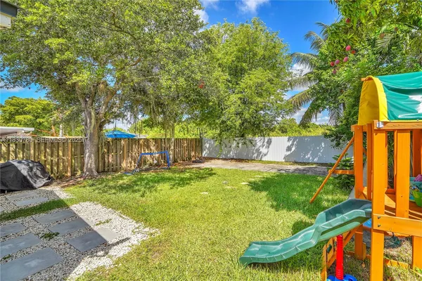 a view of a garden with a slide
