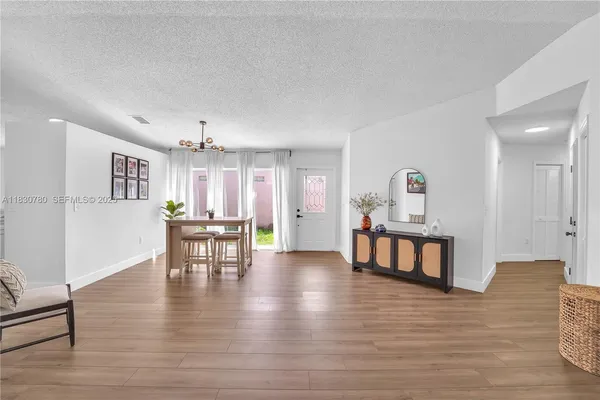 a living room with furniture and a table