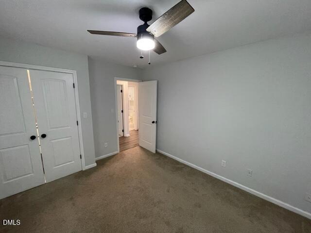 4804 Hoyle Drive, Unit A Raleigh, NC 27604 - Photo 17 of 19 an empty room with a ceiling fan and a window