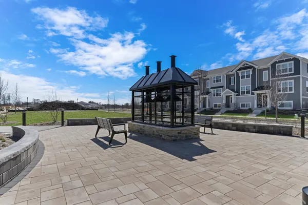 a view of a patio with a yard