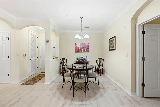 a view of a dining room with furniture