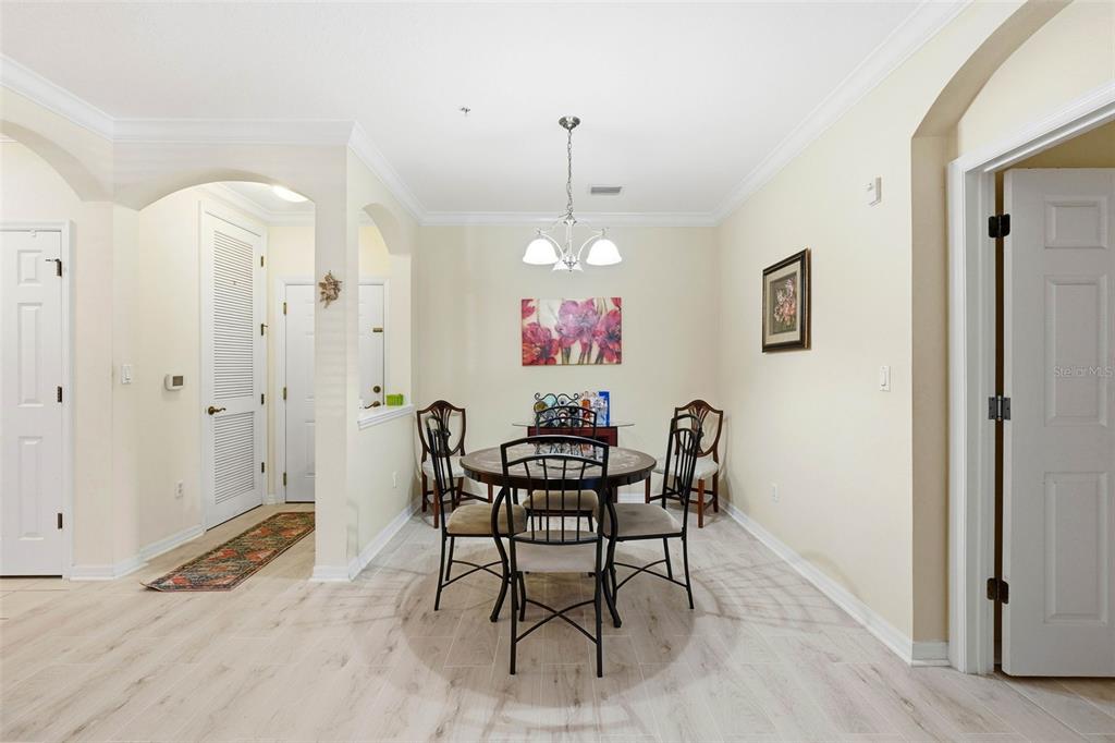 8180 Boat Hook Loop, Unit 304 Windermere, FL 34786 - Photo 14 of 38 a view of a dining room with furniture