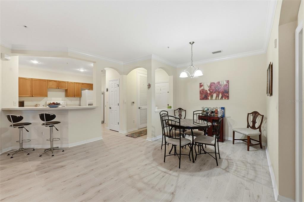 8180 Boat Hook Loop, Unit 304 Windermere, FL 34786 - Photo 15 of 38 a view of a dining room with furniture