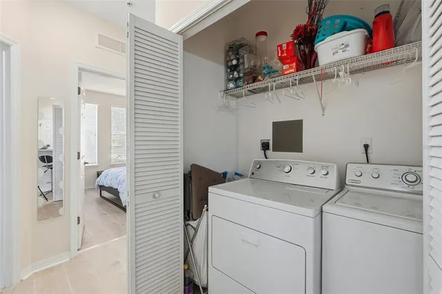 a utility room with dryer and washer