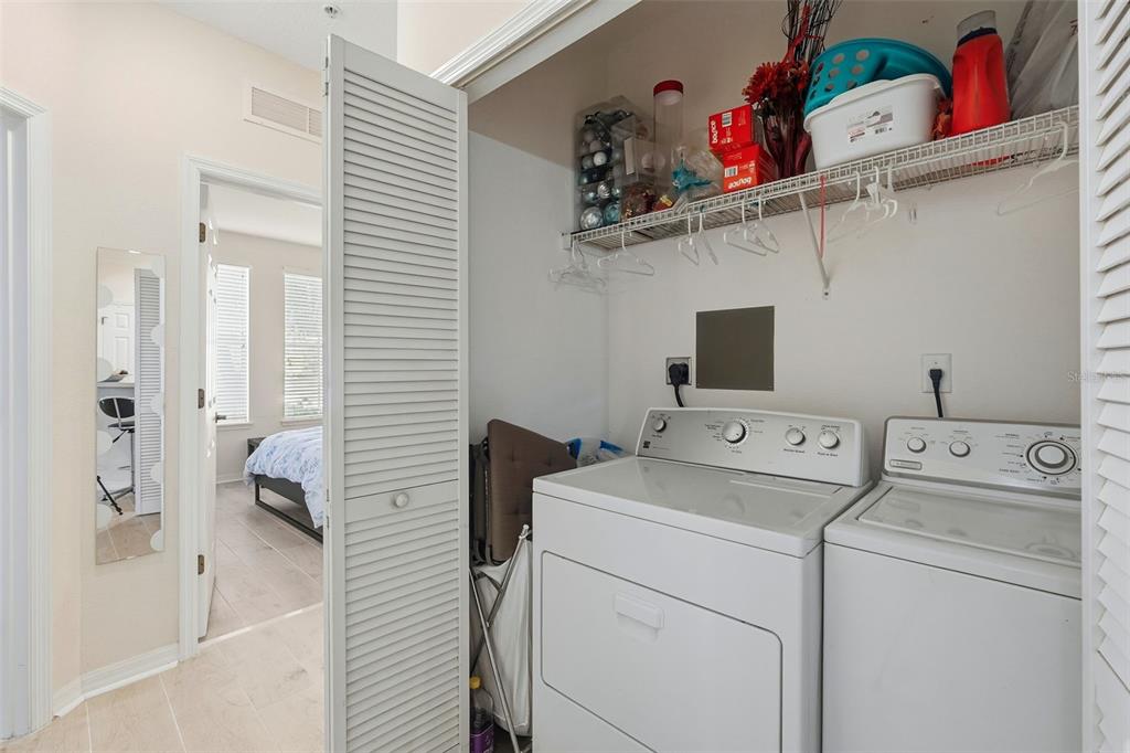 8180 Boat Hook Loop, Unit 304 Windermere, FL 34786 - Photo 28 of 38 a utility room with dryer and washer