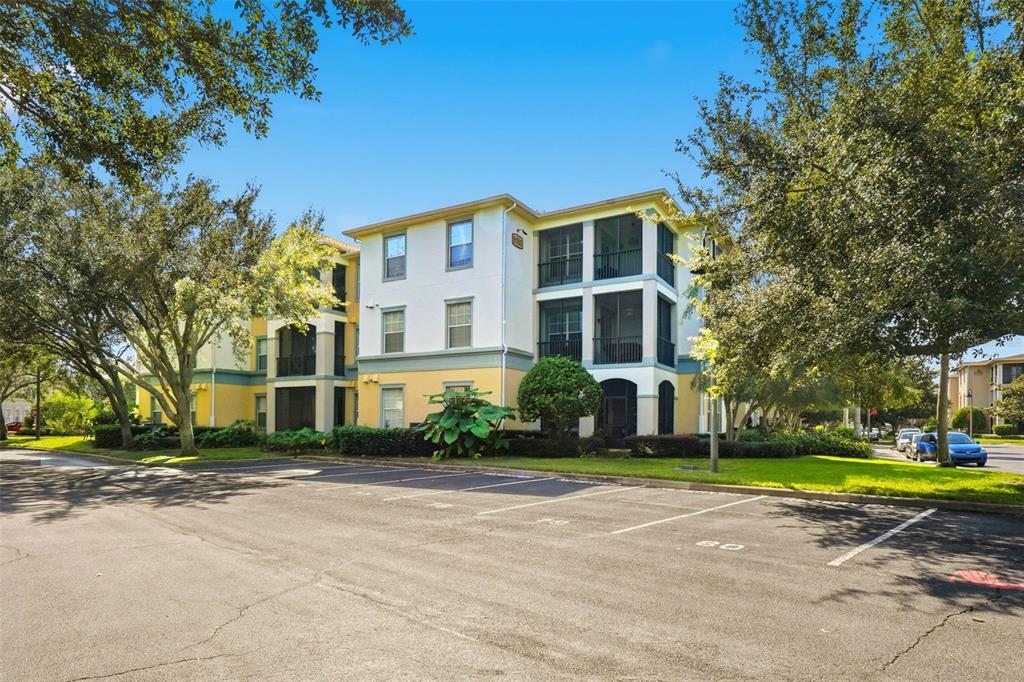 8180 Boat Hook Loop, Unit 304 Windermere, FL 34786 - Photo 29 of 38 a view of a house with a garden