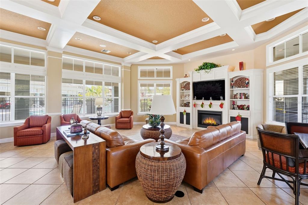 8180 Boat Hook Loop, Unit 304 Windermere, FL 34786 - Photo 32 of 38 a living room with fireplace furniture and a flat screen tv