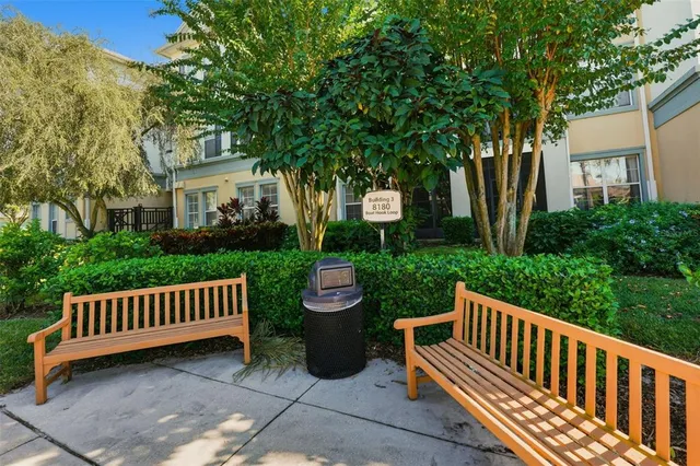 a view of a chair and table in the patio