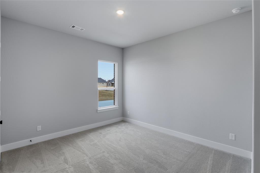 812 Vly Rdg Road Van Alstyne, TX 75495 - Photo 26 of 33 an empty room with a window