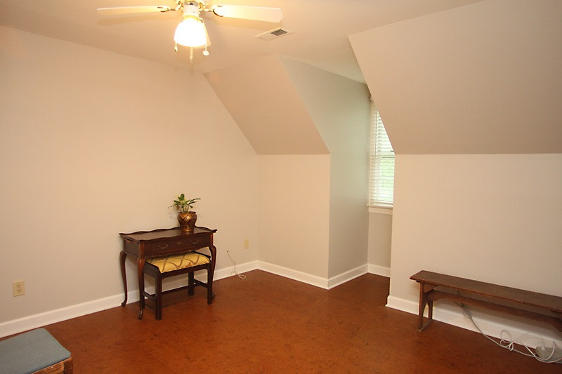 12301 Staunton Court Raleigh, NC 27613 - Photo 17 of 25 4th bedroom is currently used as office space. Cork floors add a unique touch. Bedroom 4