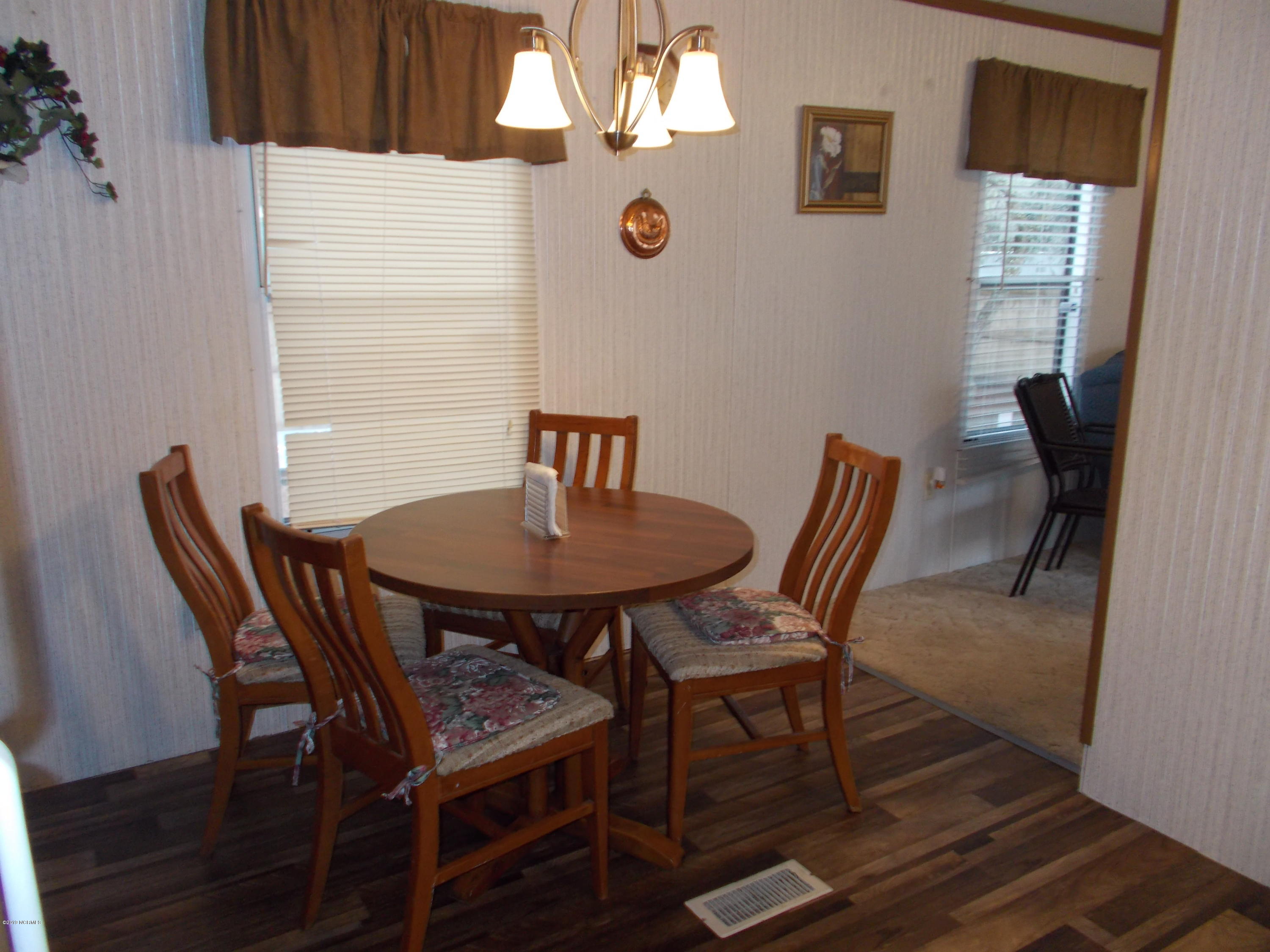 2384 Seashore Road Southwest Supply, NC 28462 - Photo 12 of 29 Updated lighting in kitchen area.