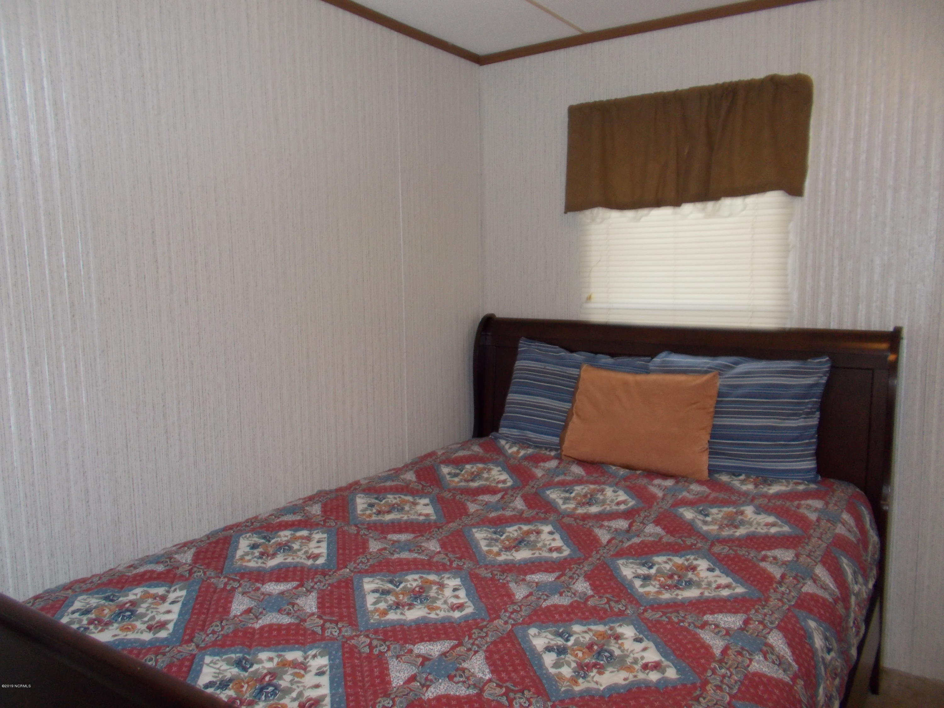 2384 Seashore Road Southwest Supply, NC 28462 - Photo 24 of 29 Bedroom 2