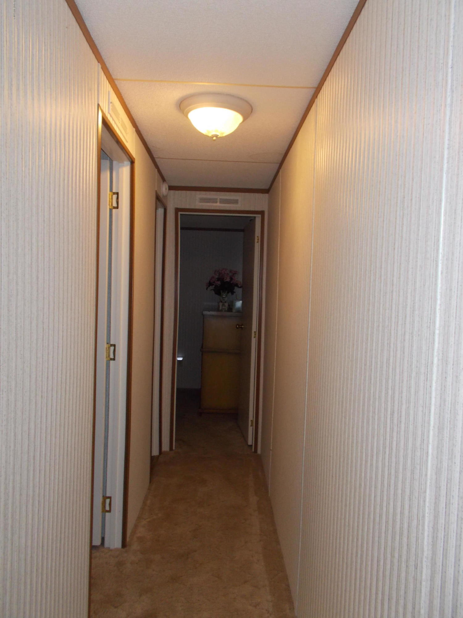 2384 Seashore Road Southwest Supply, NC 28462 - Photo 26 of 29 Hallway to guest bedrooms and bath
