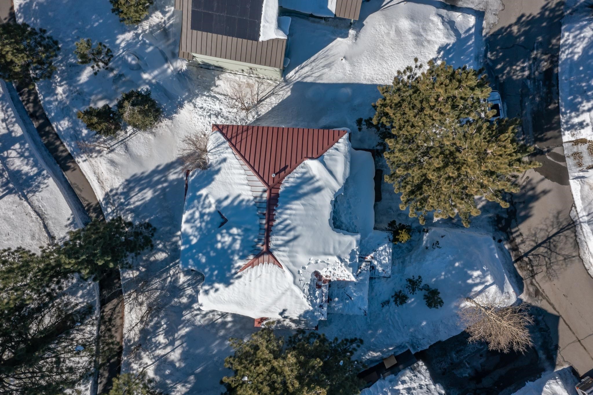 56 Wagon Road Mammoth Lakes, CA 93546 - Photo 49 of 53 an aerial view of a house with a yard
