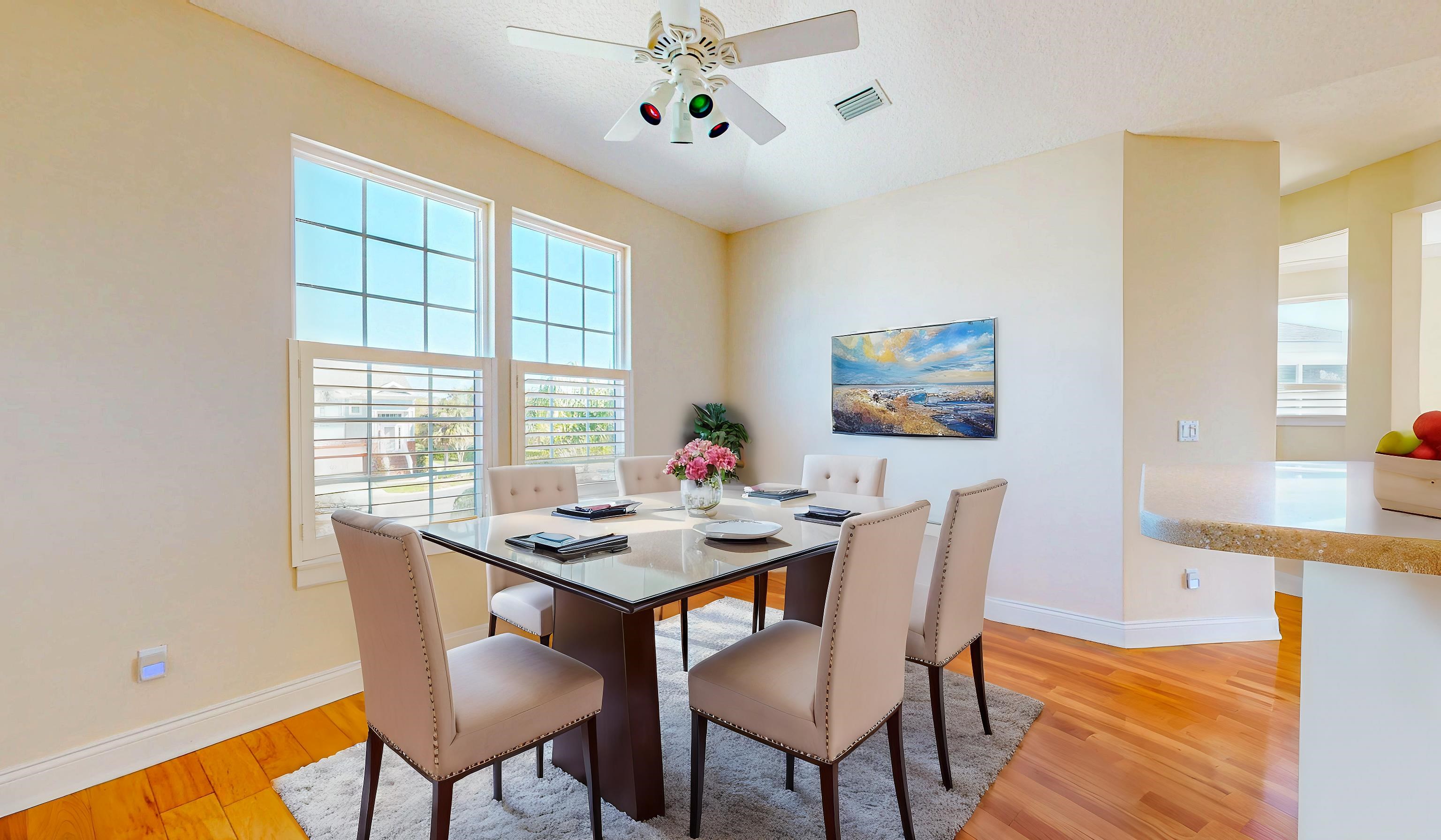213 Sunset Point St. Augustine, FL 32080 - Photo 14 of 37 a view of a dining room with furniture window and outside view