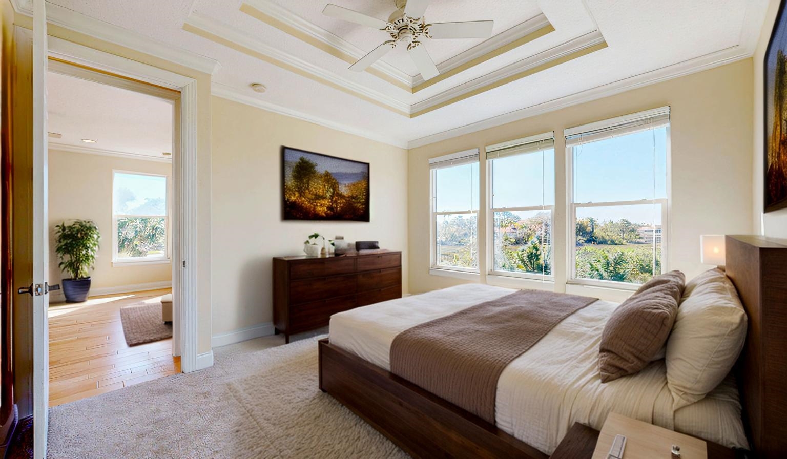 213 Sunset Point St. Augustine, FL 32080 - Photo 16 of 37 a bedroom with a bed and a flat screen tv