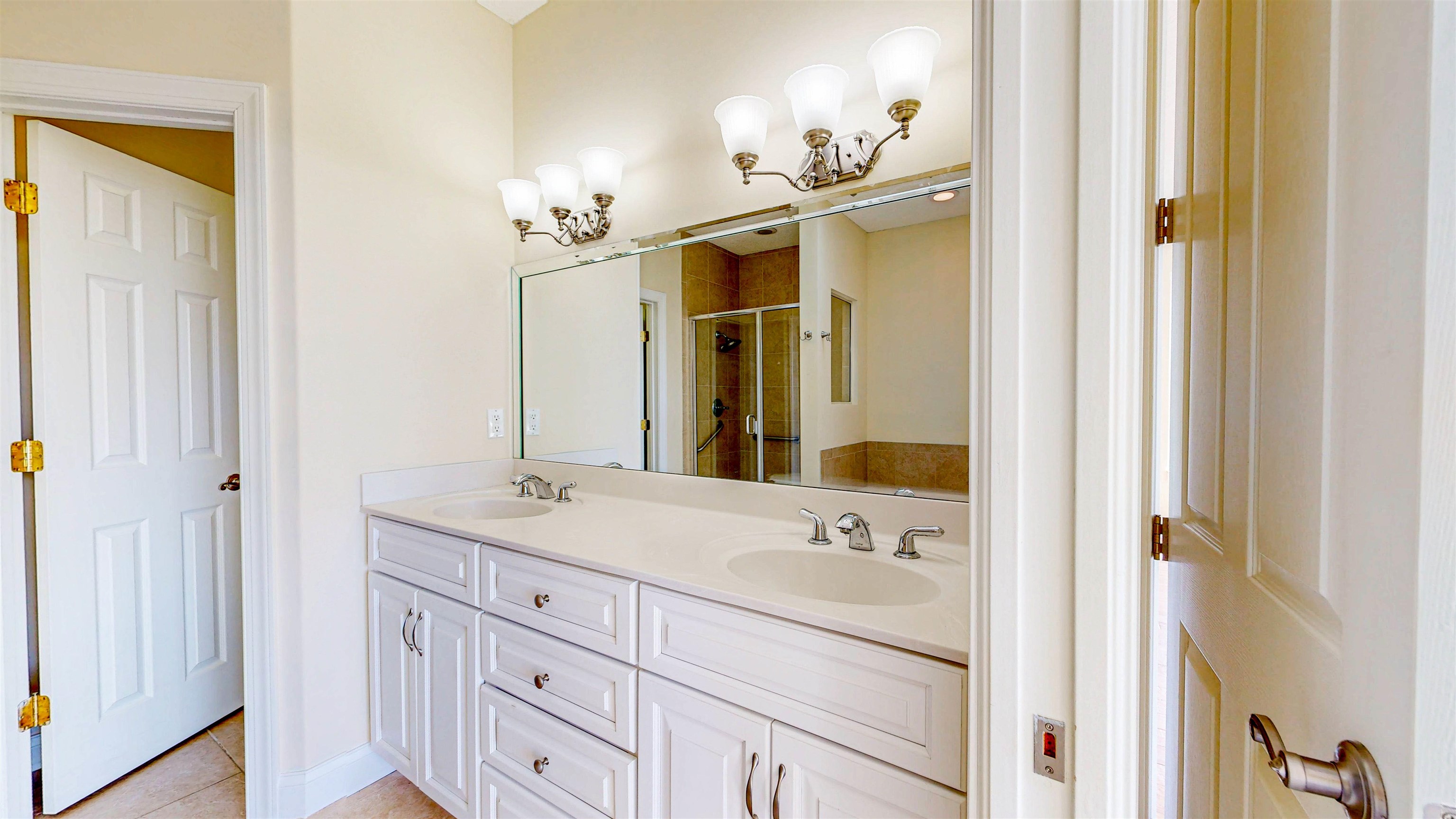 213 Sunset Point St. Augustine, FL 32080 - Photo 17 of 37 a bathroom with a granite countertop sink and a mirror