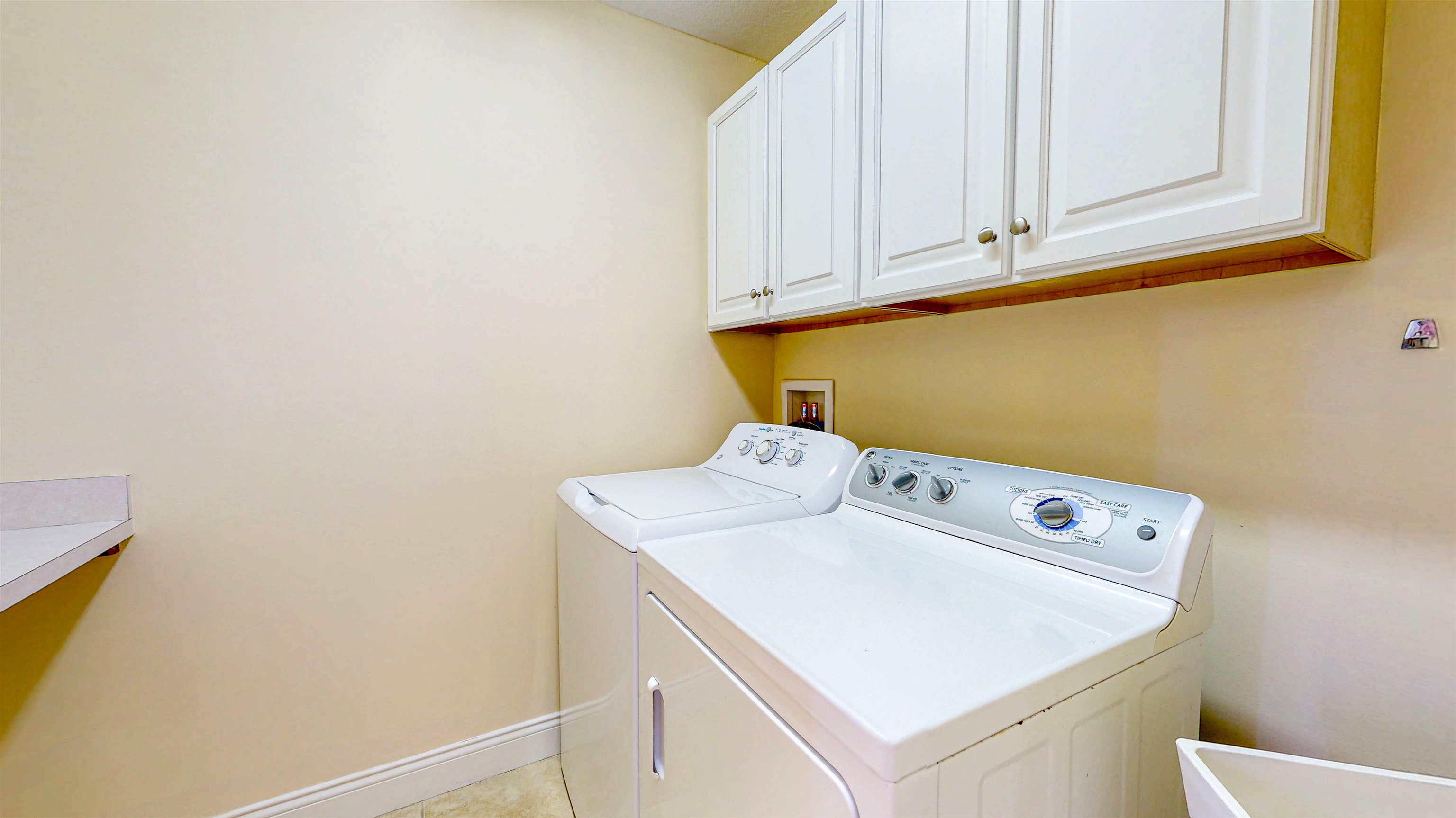213 Sunset Point St. Augustine, FL 32080 - Photo 28 of 37 a utility room with dryer and washer