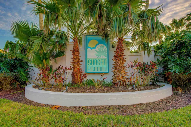 a view of a patio with a bench