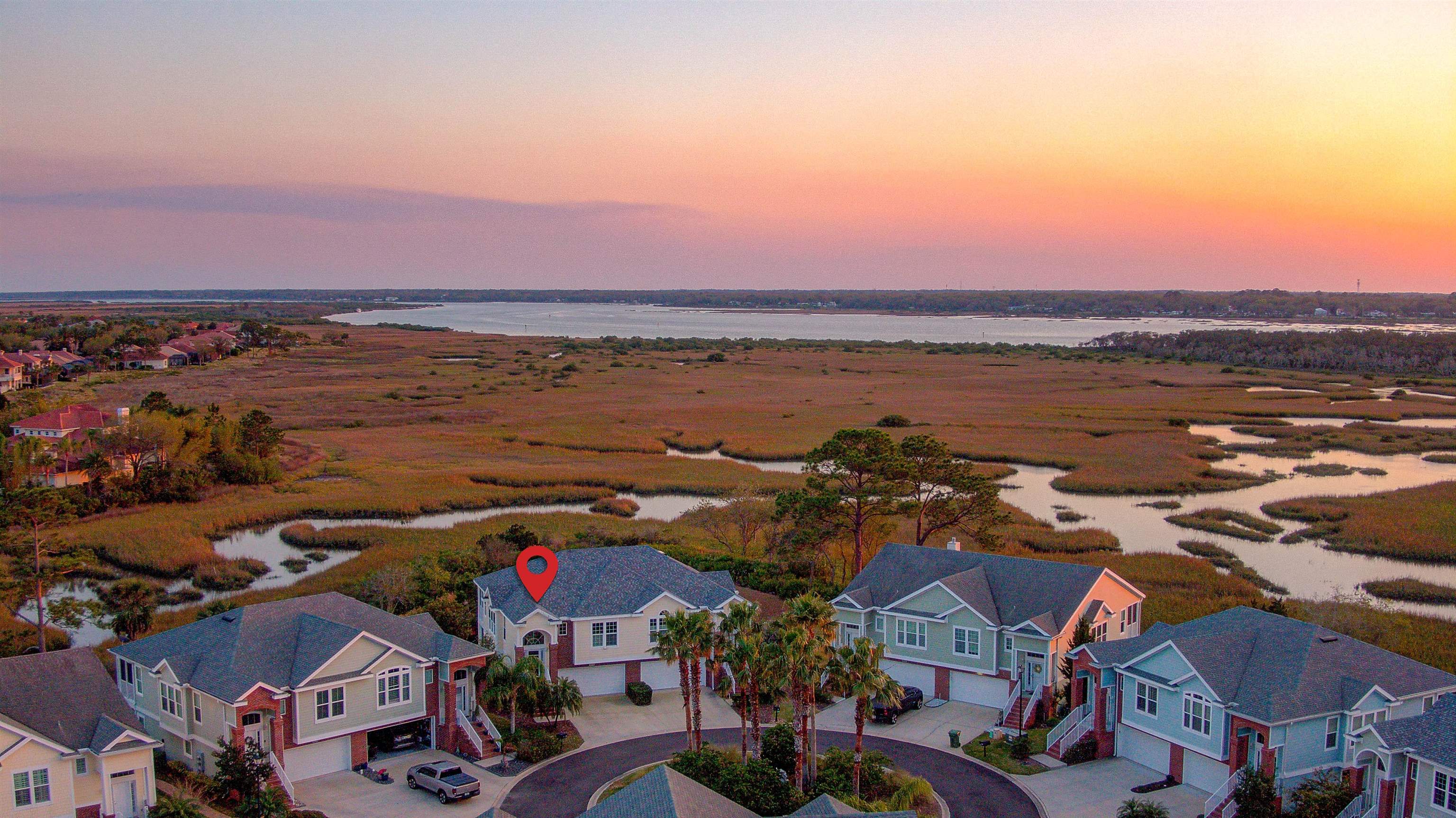 213 Sunset Point St. Augustine, FL 32080 - Photo 4 of 37 an aerial view of houses with outdoor space