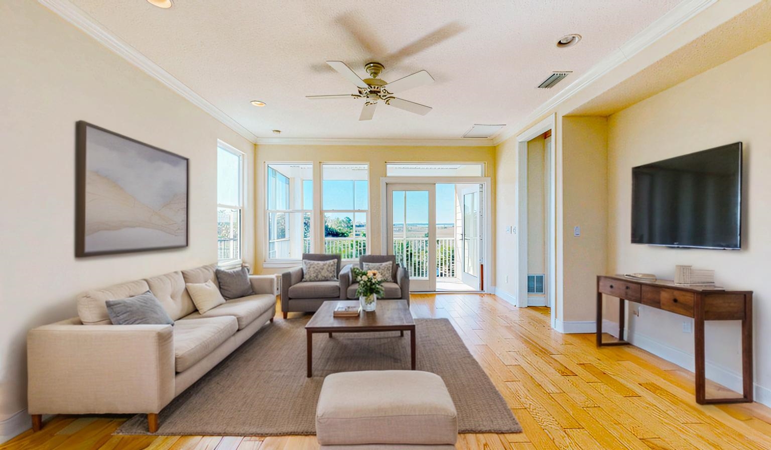 213 Sunset Point St. Augustine, FL 32080 - Photo 5 of 37 a living room with furniture and a flat screen tv