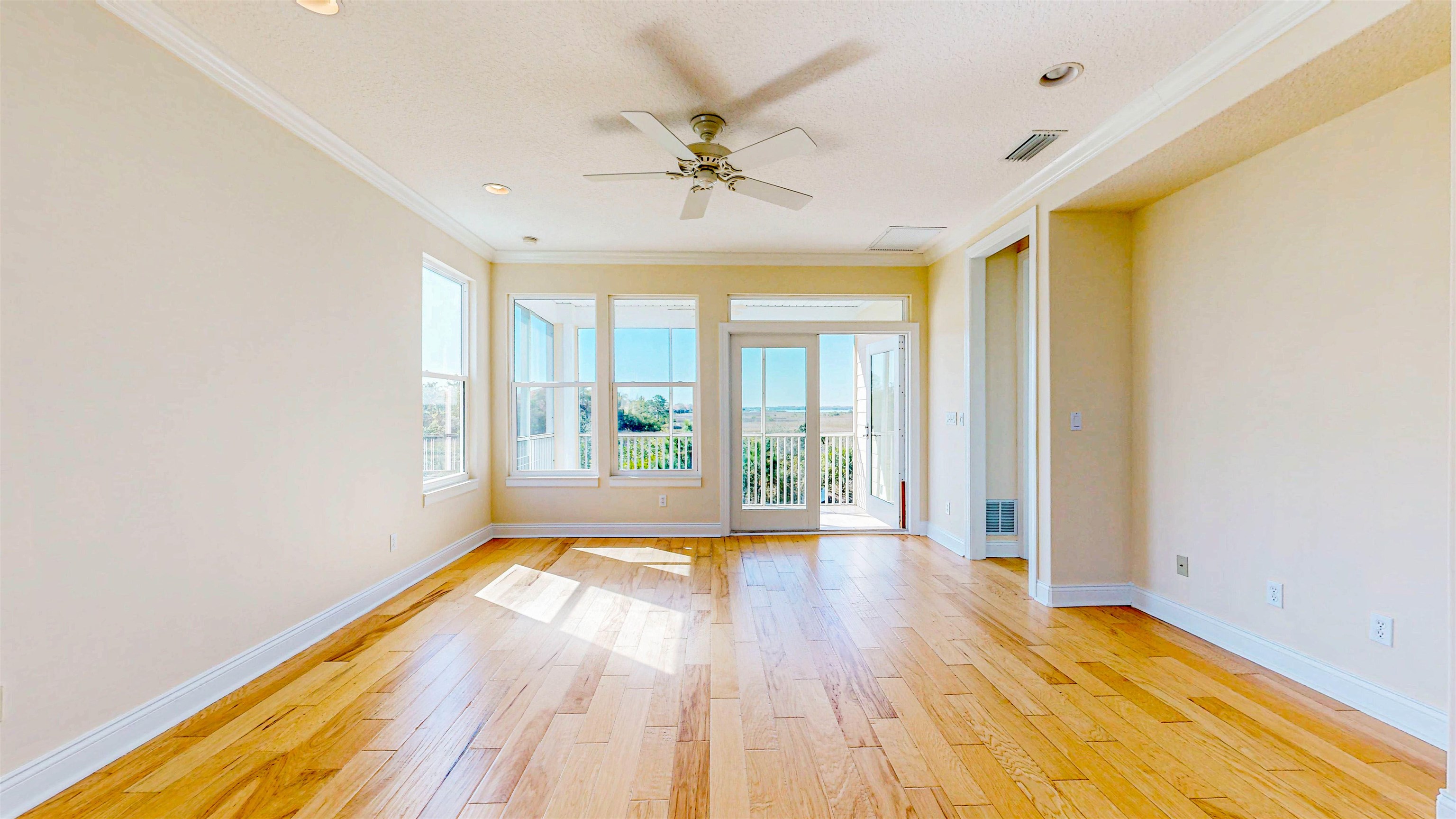 213 Sunset Point St. Augustine, FL 32080 - Photo 6 of 37 a view of an entryway with wooden floor