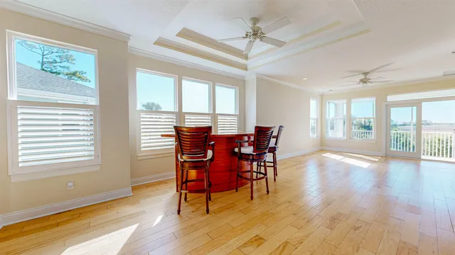 a kitchen with white cabinets and white stainless steel appliances