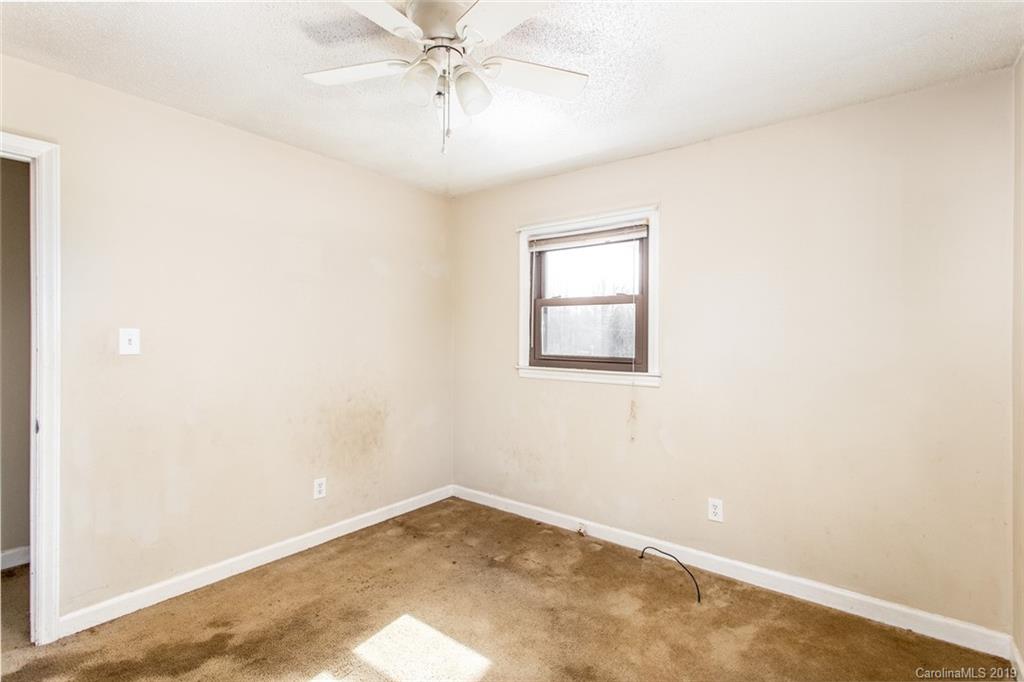 1314 Love Road Monroe, NC 28110 - Photo 35 of 36 an empty room with a window