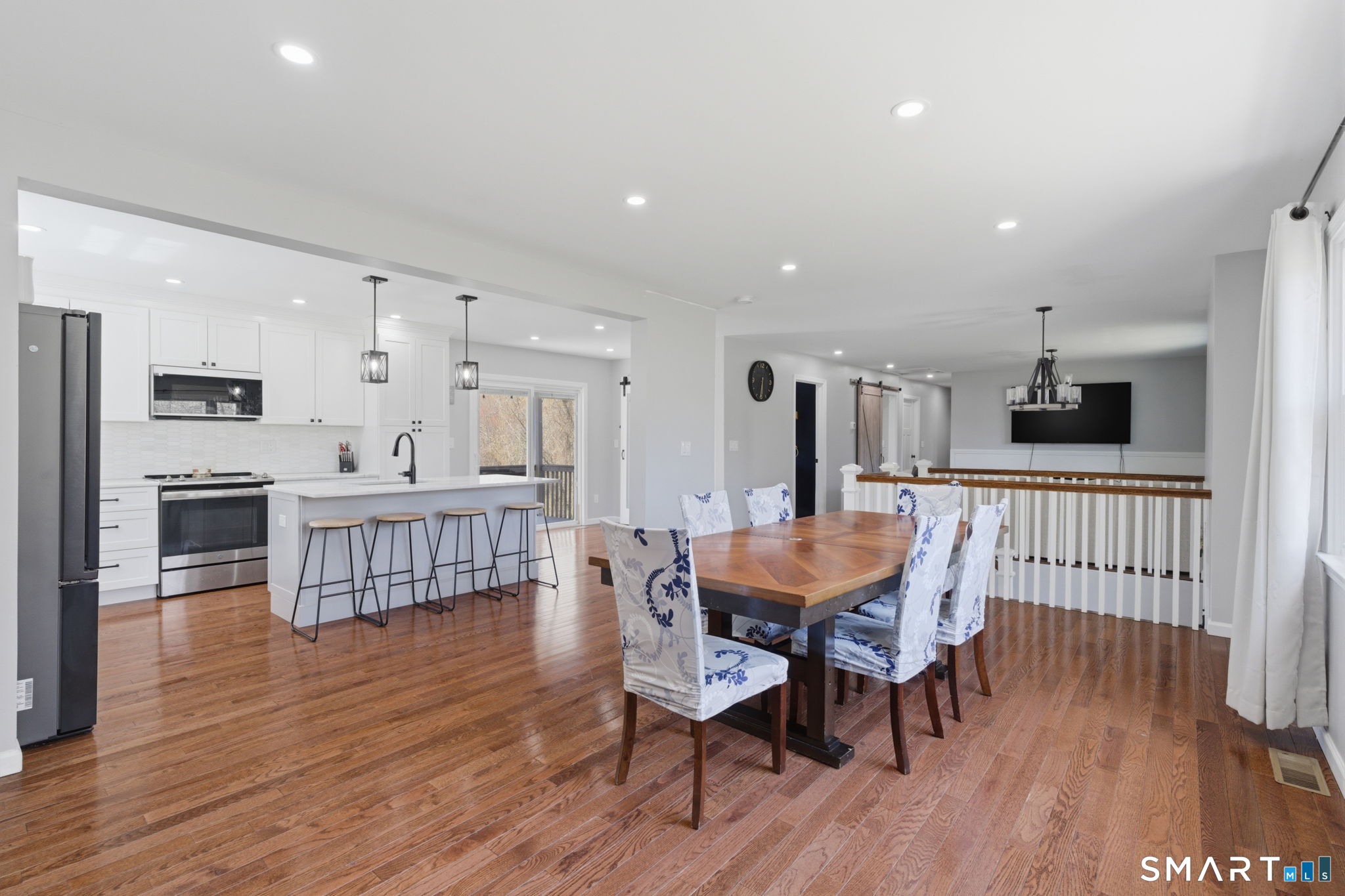 99 West Chippens Hill Road Burlington, CT 06013 - Photo 17 of 40 a view of a dining room with furniture and wooden floor